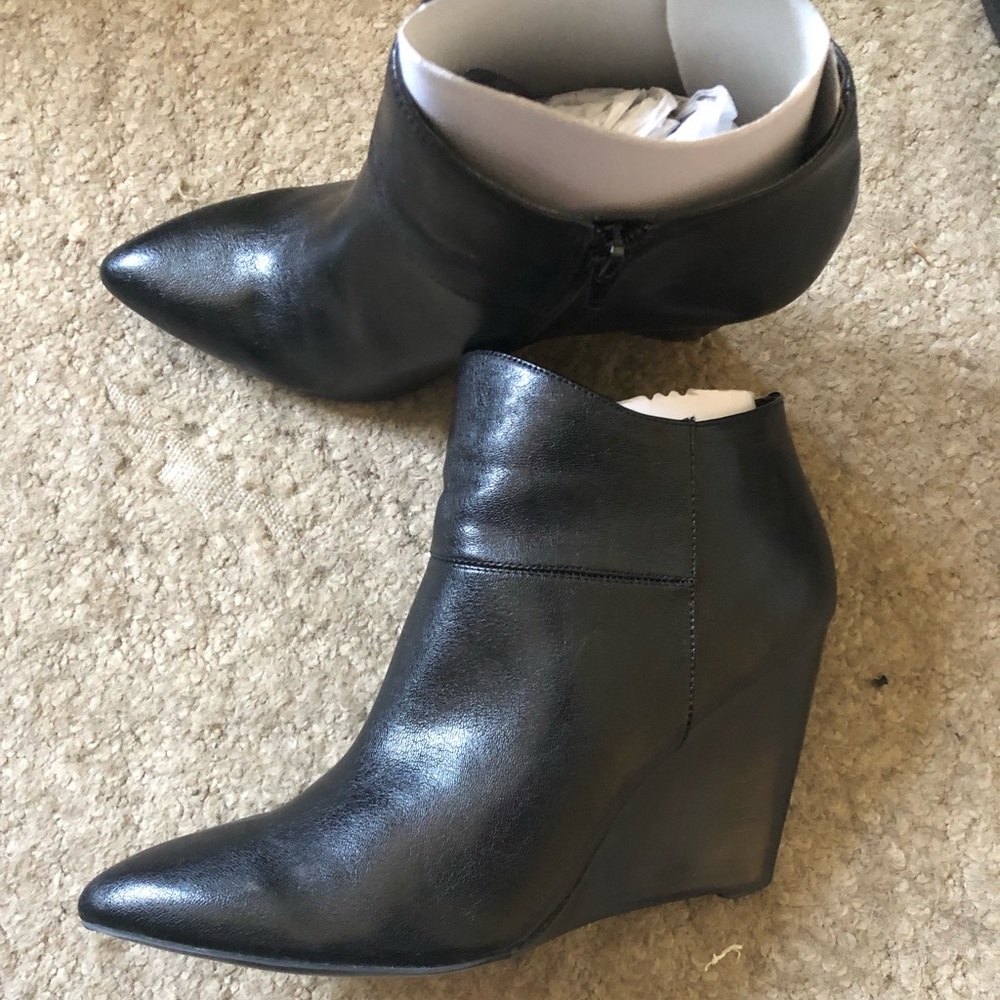Nine West - Sleek Black bootie on 4" wedge.